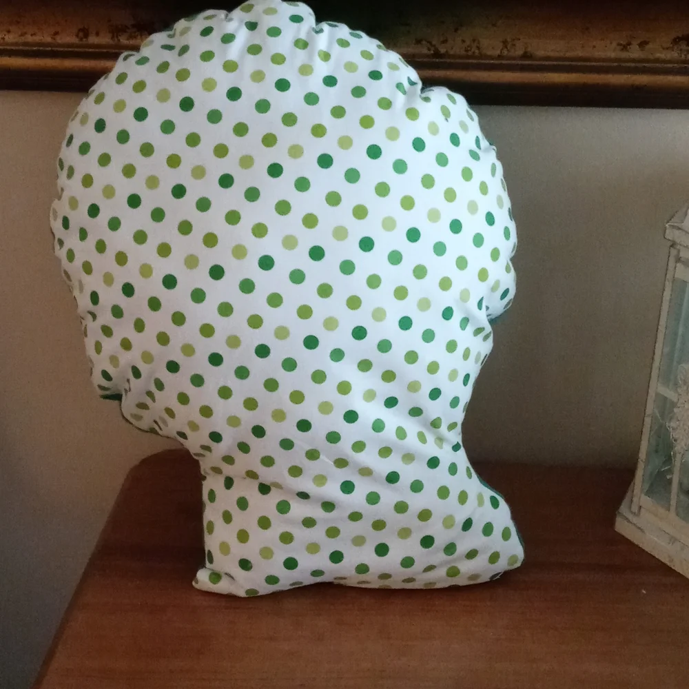 Unique grinch pillow.